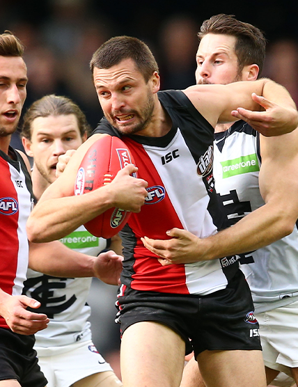 St Kilda Football Club's Jarryn Geary Being Tackled By Cartlon Football Club's Matthew Wright