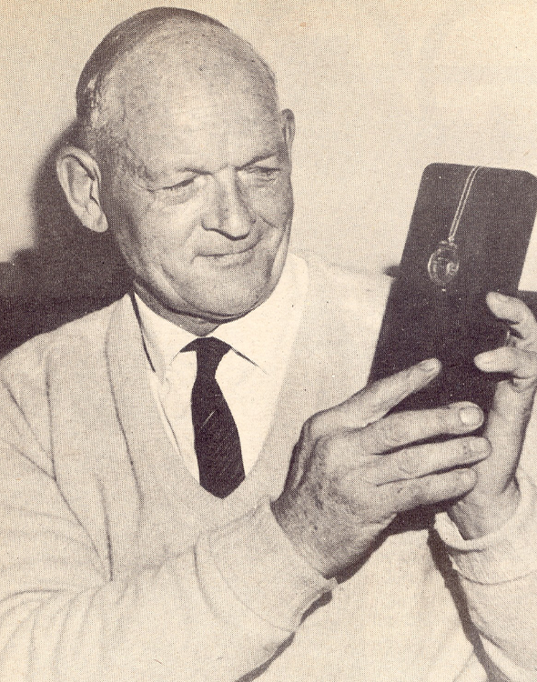 Leslie ‘Peter’ Chitty Holding a Medal