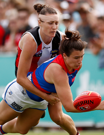 St Kilda Football Club's Clara Fitzpatrick Tackling a Western Bulldogs Player