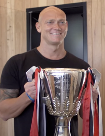 Michael Klim Holding the 1966 Premiership Cup